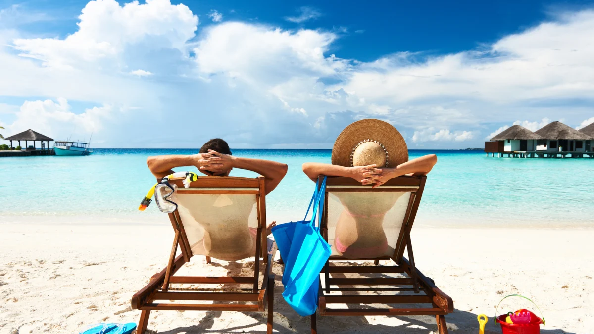 Man and Woman relaxing on a beach